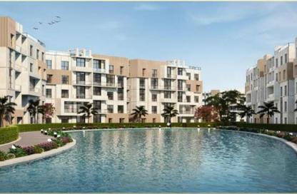 Apartment - 3 Bedrooms - 3 Bathrooms for sale in Aqmar - Al Wahat Road - 6 October City - Giza
