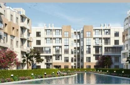 Apartment - 3 Bedrooms - 3 Bathrooms for sale in Aqmar - Al Wahat Road - 6 October City - Giza