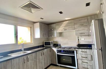 Apartment - 2 Bedrooms - 3 Bathrooms for sale in Amberville - 6 October City - Giza