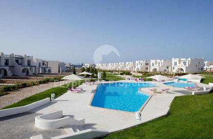 Chalet - 2 Bedrooms - 2 Bathrooms for sale in Evia - Qesm Ad Dabaah - North Coast