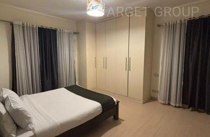 Apartment - 1 - 1 for rent in The Village - South Investors Area - New Cairo City - Cairo