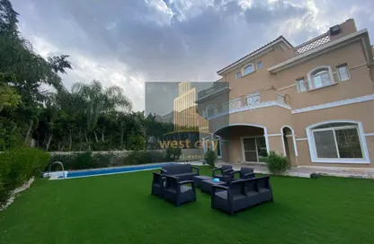 Villa - 5 Bedrooms - 5 Bathrooms for sale in Mena Garden City - Al Motamayez District - 6 October City - Giza