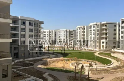Apartment - 2 Bedrooms - 3 Bathrooms for sale in The Residences - New Cairo City - Cairo