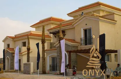 Villa - 5 Bedrooms - 4 Bathrooms for sale in Al Maqsad - New Capital Compounds - New Capital City - Cairo