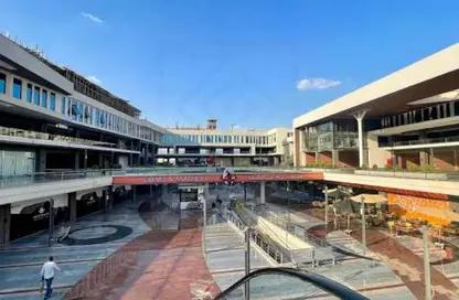 Shop - Studio - 2 Bathrooms for sale in West Gate - 6 October Compounds - 6 October City - Giza