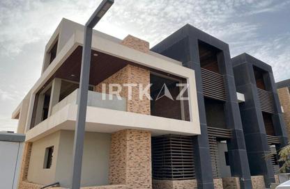 Townhouse - 4 - 4 for sale in Midtown Sky - New Capital Compounds - New Capital City - Cairo