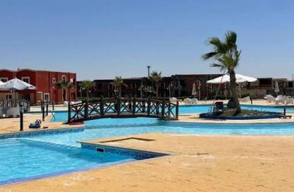Chalet - 2 Bedrooms - 2 Bathrooms for sale in Bungalows - Markaz Al Hamam - North Coast Chalet - 2 Bedrooms - 2 Bathrooms for sale in Bungalows - Markaz Al Hamam - North Coast