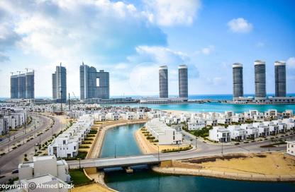 Chalet - 2 Bedrooms - 2 Bathrooms for sale in Latin District - New Alamein City - Al Alamein - North Coast
