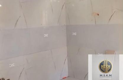 Apartment - 2 Bedrooms - 2 Bathrooms for sale in Mohamed Naguib Axis - Abou El Houl - New Cairo City - Cairo Apartment - 2 Bedrooms - 2 Bathrooms for sale in Mohamed Naguib Axis - Abou El Houl - New Cairo City - Cairo
