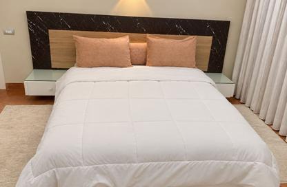 Apartment - Studio - 1 for rent in The Village - South Investors Area - New Cairo City - Cairo