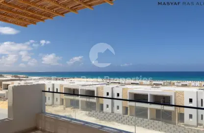 Chalet - 2 Bedrooms - 3 Bathrooms for sale in Beit Al Bahr - Sidi Heneish - North Coast
