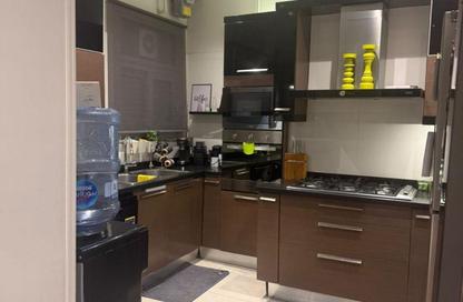 Apartment - 2 Bedrooms - 2 Bathrooms for sale in Palm Hills Village Gate - South Investors Area - New Cairo City - Cairo