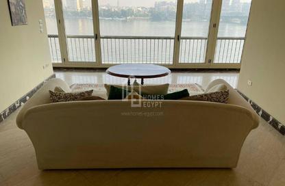 Apartment - 3 Bedrooms - 3 Bathrooms for rent in Nile St. - Dokki - Giza