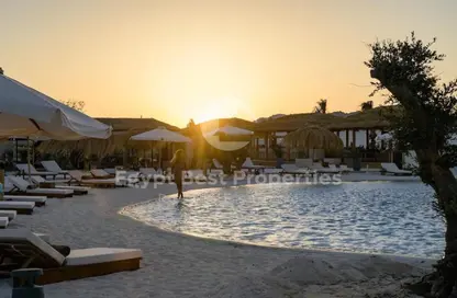 Chalet - 2 Bedrooms - 3 Bathrooms for sale in Ramla Lakeside - Qesm Ad Dabaah - North Coast