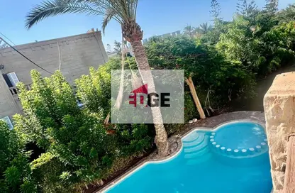 Twin House - 5 Bedrooms - 4 Bathrooms for sale in Marina 5 - Marina - Al Alamein - North Coast