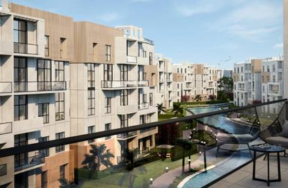 Apartment - 4 Bedrooms - 4 Bathrooms for sale in Aqmar - Al Wahat Road - 6 October City - Giza