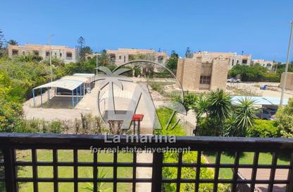 Chalet - 2 Bedrooms - 2 Bathrooms for sale in Marina 4 - Marina - Al Alamein - North Coast