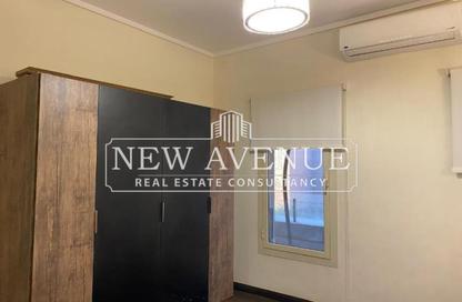 Apartment - 2 Bedrooms - 2 Bathrooms for sale in The Village - South Investors Area - New Cairo City - Cairo