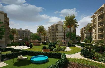 Apartment - 3 Bedrooms - 2 Bathrooms for sale in Garden Gate - Ashgar City - Al Wahat Road - 6 October City - Giza