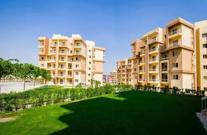 Apartment - 2 Bedrooms - 2 Bathrooms for sale in Garden Gate - Ashgar City - Al Wahat Road - 6 October City - Giza