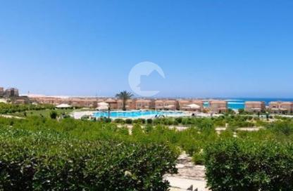 Chalet - 4 Bedrooms - 5 Bathrooms for sale in Telal Alamein - Sidi Abdel Rahman - North Coast