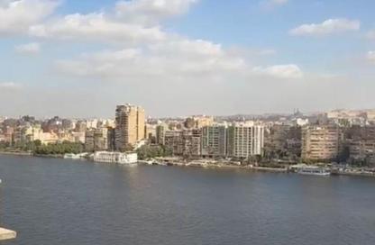 Apartment - 3 Bedrooms - 3 Bathrooms for sale in Nile St. - Dokki - Giza