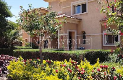 Townhouse - 3 Bedrooms - 5 Bathrooms for sale in Mena Residence - South Investors Area - New Cairo City - Cairo Townhouse - 3 Bedrooms - 5 Bathrooms for sale in Mena Residence - South Investors Area - New Cairo City - Cairo