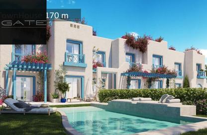 Townhouse - 3 Bedrooms - 3 Bathrooms for sale in Evia - Qesm Ad Dabaah - North Coast