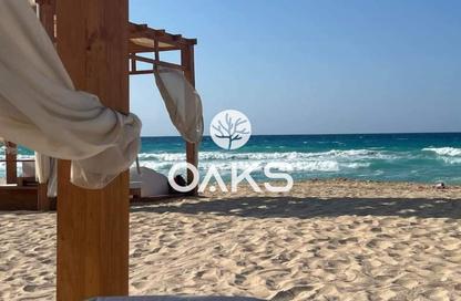 Chalet - 2 Bedrooms - 2 Bathrooms for sale in Ramla Lakeside - Qesm Ad Dabaah - North Coast