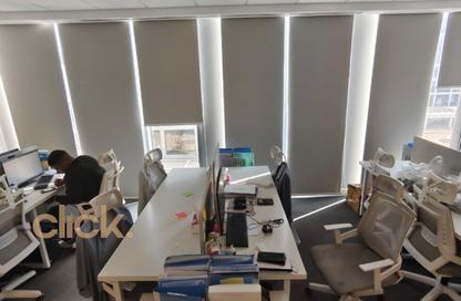 Office Space - Studio - 2 Bathrooms for rent in Cairo Festival City - North Investors Area - New Cairo City - Cairo