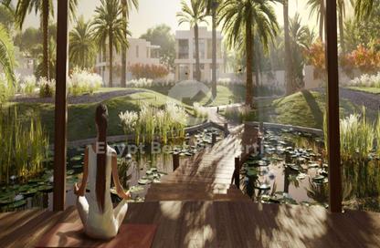 Townhouse - 4 - 4 for sale in Elan - Cairo Gate - Sheikh Zayed Compounds - Sheikh Zayed City - Giza
