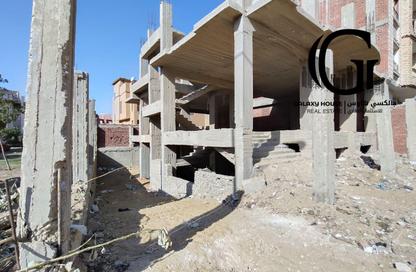 Whole Building - 3 Bedrooms - 3 Bathrooms for sale in Tahrir St. - 7th Neighborhood - Family Housing - Shorouk City - Cairo