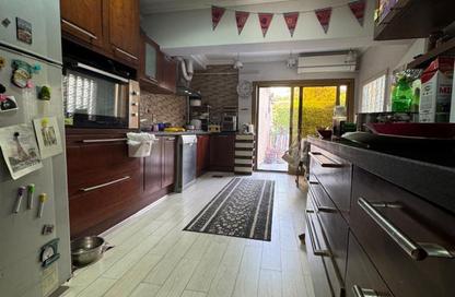 Townhouse - 4 Bedrooms - 4 Bathrooms for sale in Mena Garden City - Al Motamayez District - 6 October City - Giza