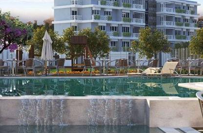 Apartment - 2 Bedrooms - 2 Bathrooms for sale in Green 6 - 6 October Compounds - 6 October City - Giza