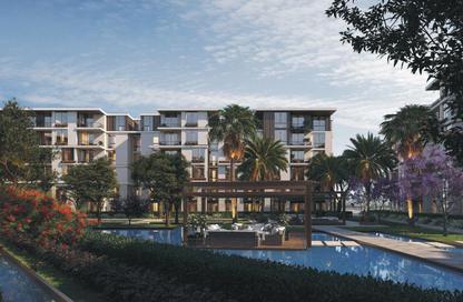 Apartment - 2 Bedrooms - 2 Bathrooms for sale in Tesla Residence - Al Wahat Road - 6 October City - Giza