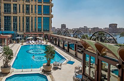 Apartment - 4 Bedrooms - 4 Bathrooms for sale in Nile St. - Dokki - Giza