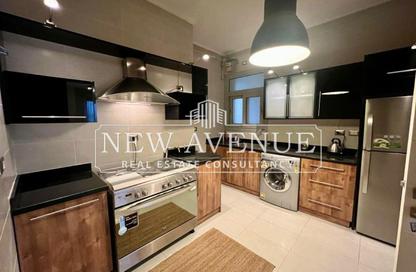 Apartment - 2 Bedrooms - 2 Bathrooms for sale in Palm Hills Village Gate - South Investors Area - New Cairo City - Cairo