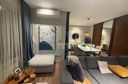 Apartment - 2 Bedrooms - 2 Bathrooms for sale in Palm Hills Village Gate - South Investors Area - New Cairo City - Cairo
