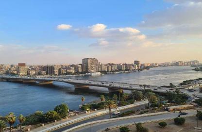 Apartment - 3 Bedrooms - 3 Bathrooms for sale in Nile St. - Dokki - Giza