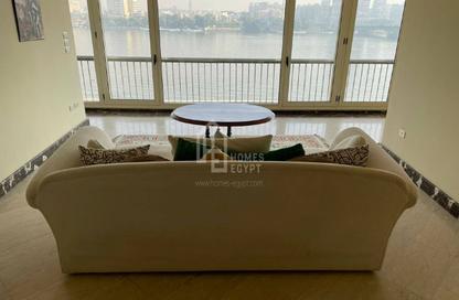 Apartment - 3 Bedrooms - 3 Bathrooms for rent in Nile St. - Dokki - Giza