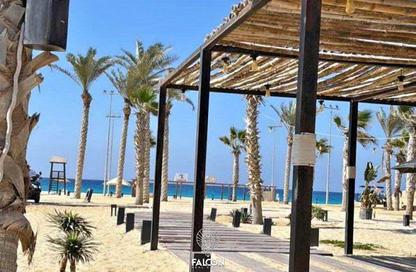 Chalet - 2 Bedrooms - 2 Bathrooms for sale in Ramla Lakeside - Qesm Ad Dabaah - North Coast Chalet - 2 Bedrooms - 2 Bathrooms for sale in Ramla Lakeside - Qesm Ad Dabaah - North Coast