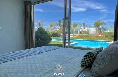 Chalet - 2 Bedrooms - 2 Bathrooms for sale in Ramla Lakeside - Qesm Ad Dabaah - North Coast