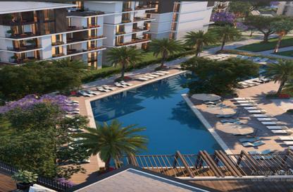 Apartment - 2 Bedrooms - 2 Bathrooms for sale in Tesla Residence - Al Wahat Road - 6 October City - Giza
