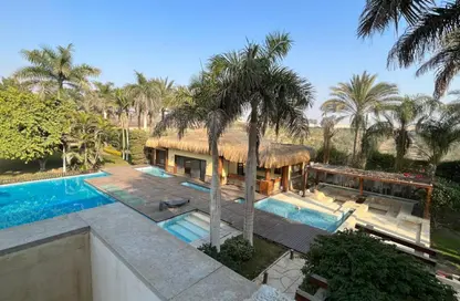 Villa - 7+ Bedrooms - 7+ Bathrooms for sale in New Giza - Cairo Alexandria Desert Road - 6 October City - Giza