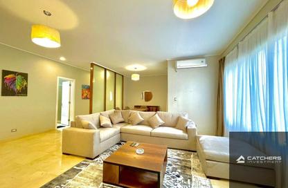 Apartment - 2 Bedrooms - 2 Bathrooms for sale in Palm Hills Village Gate - South Investors Area - New Cairo City - Cairo