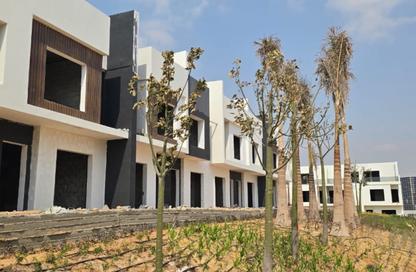 Townhouse - 4 - 3 for sale in West Woods - Fayoum Desert road - 6 October City - Giza