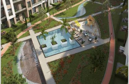 Apartment - 2 Bedrooms - 2 Bathrooms for sale in Green Revolution - Sheikh Zayed Compounds - Sheikh Zayed City - Giza
