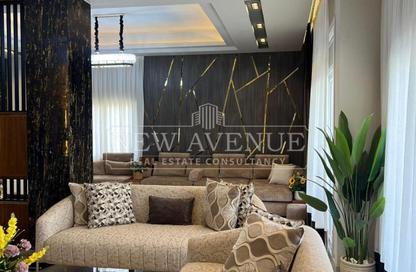 Villa - 5 Bedrooms - 6 Bathrooms for sale in Mena Garden City - Al Motamayez District - 6 October City - Giza