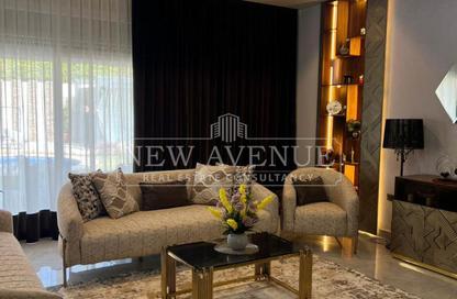 Villa - 5 Bedrooms - 6 Bathrooms for sale in Mena Garden City - Al Motamayez District - 6 October City - Giza