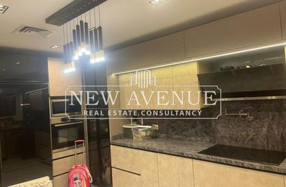 Villa - 4 Bedrooms - 2 Bathrooms for sale in The Residences - New Cairo City - Cairo